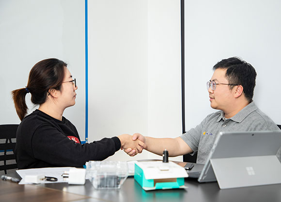 shake hand with suppliers